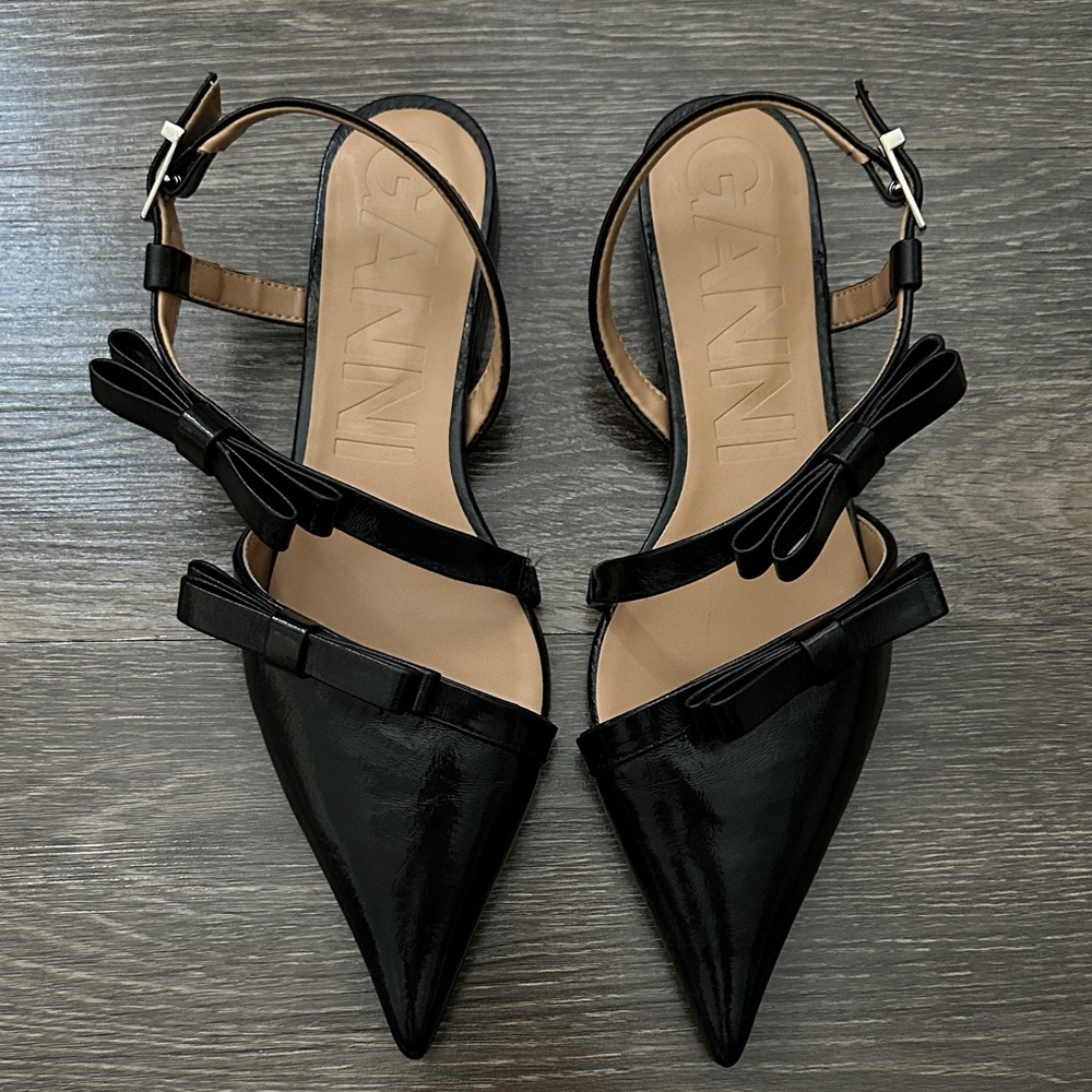 Ganni Black Pointed Flats with Bow Accents